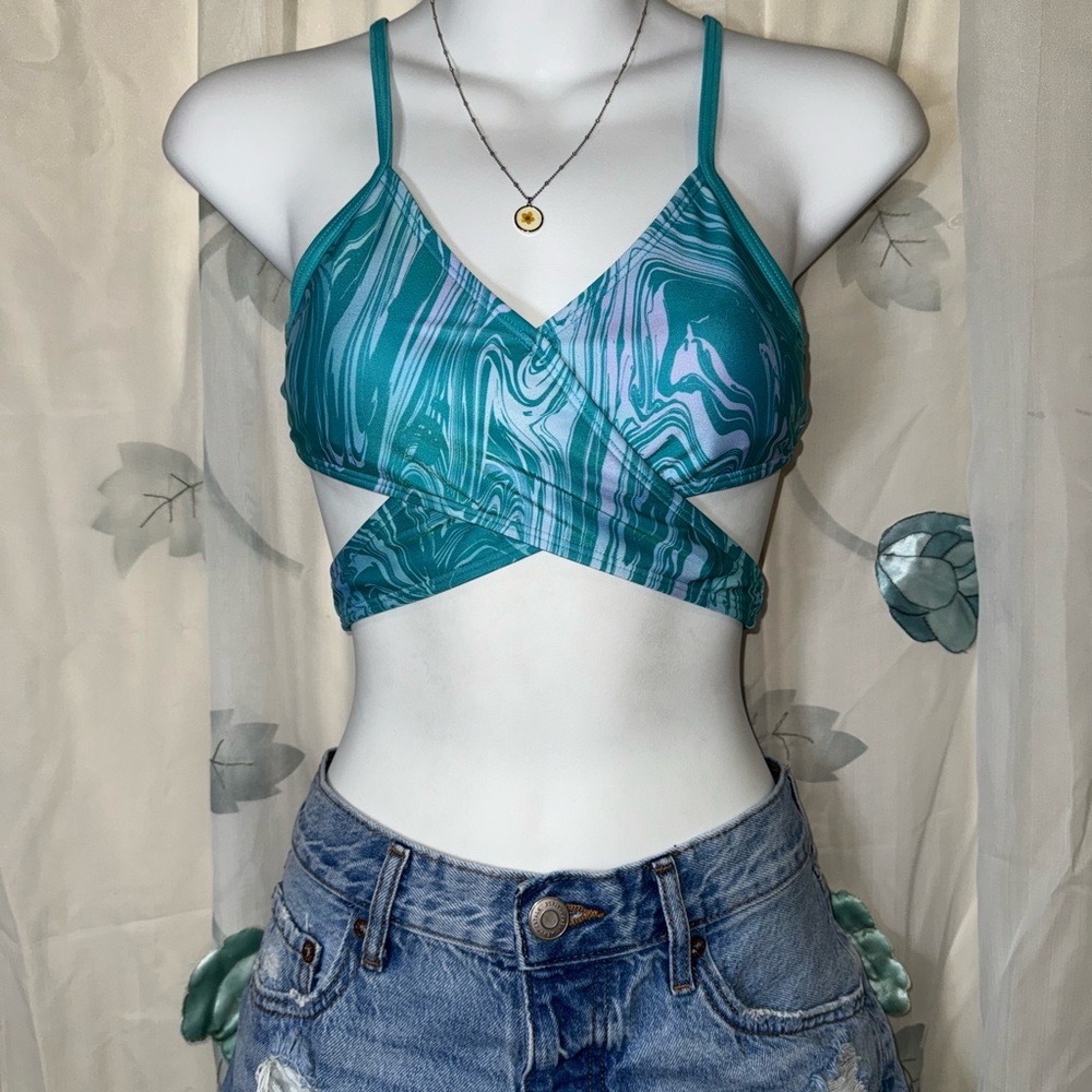 Women’s blue Swim top adjustable straps cross strap waist band bathing suit top